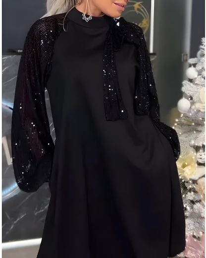 Robe noire élégante à manches pailletées