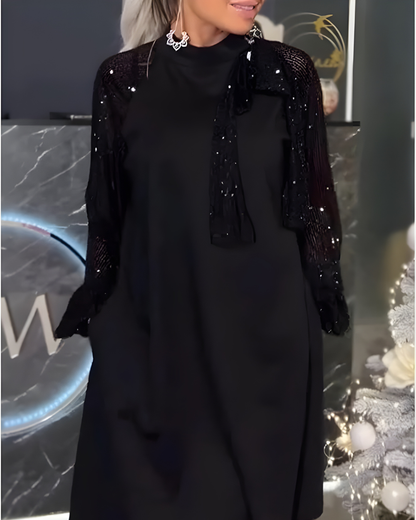 Robe noire élégante à manches pailletées